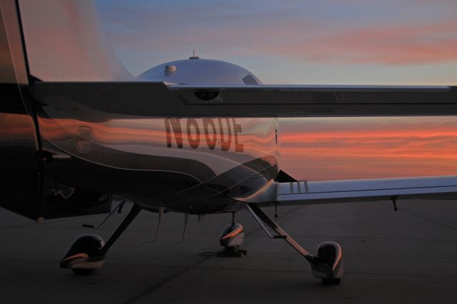 Cessna 400 (N86DE) - The morning sunrise reflects off 86DE at Colonal James Jabara.  Photo by Michael Vincent