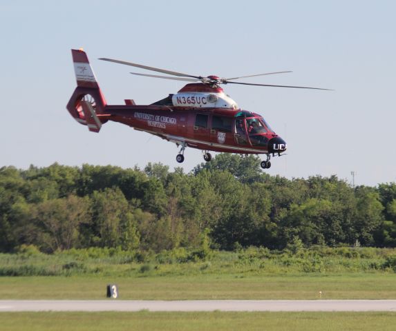 N365UC — - This is The University Of Chicago Hospital Helicopter Air Ambulance doing a rolling takeoff from taxiway "Alpha" at Gary Regional Airport. 