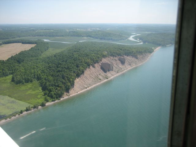 Cessna Commuter — - Cliffs south of Oswego on L.Ontario