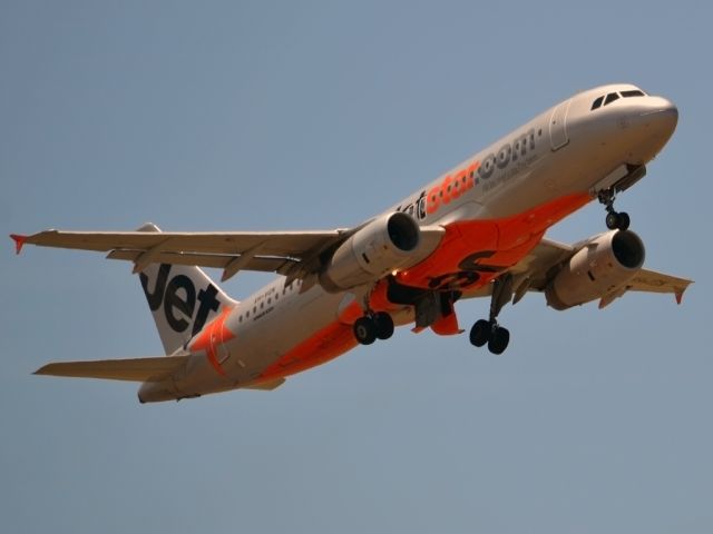 Airbus A320 (VH-VGN) - Getting airborne off runway 23. Wednesday 4th January 2012.