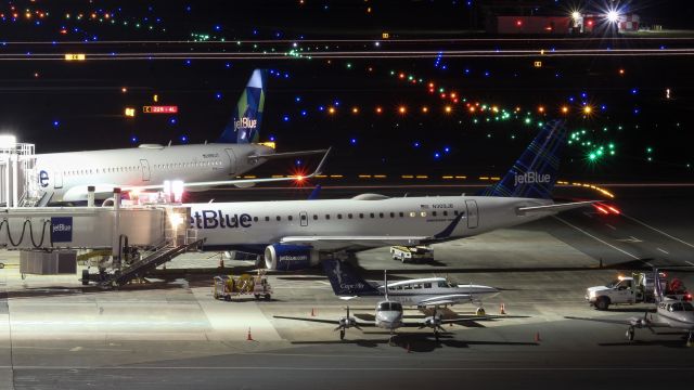 Embraer ERJ-190 (N309JB) - My second long exposure- A JetBlue E190 chilling at the gate