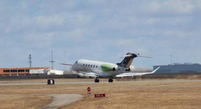 Bombardier Challenger 300 (C-GJCJ) - 022014 Challenger rotating from Rwy 1L