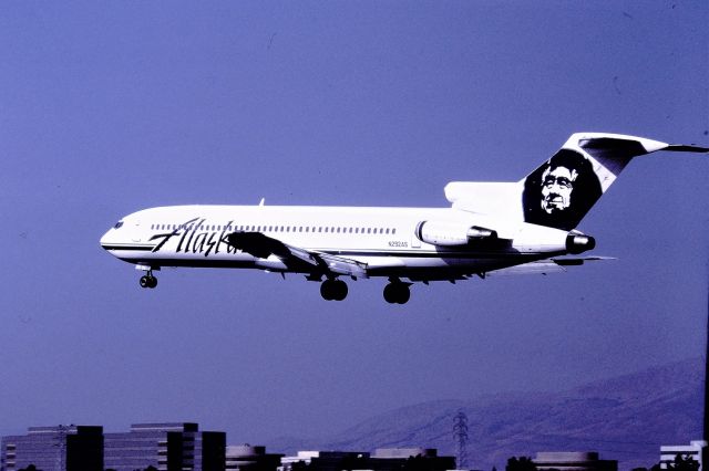 BOEING 727-200 (N292AS) - KSJC - early 1990s Alaska 727 (Ln 1327) landing 30L at San Jose from Seattle. This is one of my typical dusty color slides and the photo was taken from the famed utility box location adjacent to Airport Rd west of 30L on the perimeter fence. My only AS 727 -200 flight was Sept 1986 SJC-SEA for Expo '86 and we drove to Vancouver, BC Canada via Port Angeles, Victoria, Sydney and Ferried to BC from Vancouver Island.