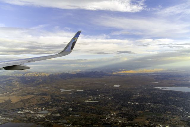 Airbus A321 (N709FR) - Departing KDEN to the west on a nice summer morning.