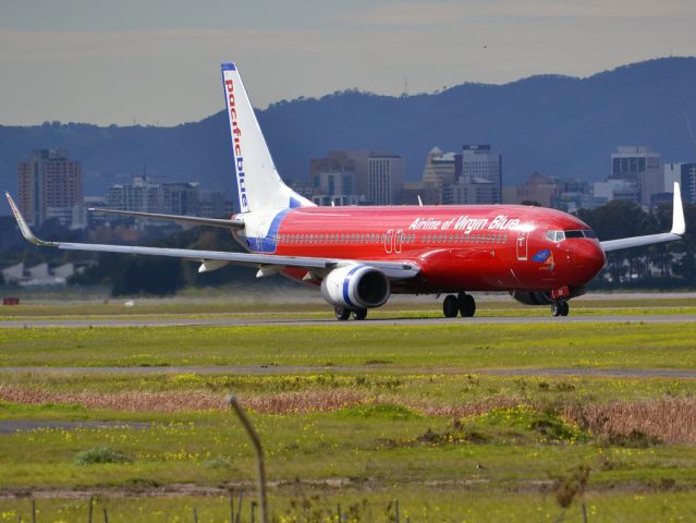 Boeing 737-800 (VH-VOX) - On taxi-way heading for take off on runway 05. Thursday 12th July 2012.