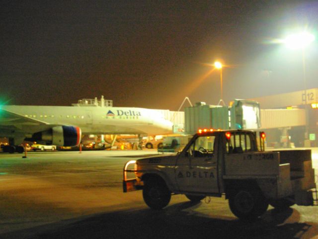 Boeing 757-200 — - My cargo bobtail truck near D12, a B752 at D13.