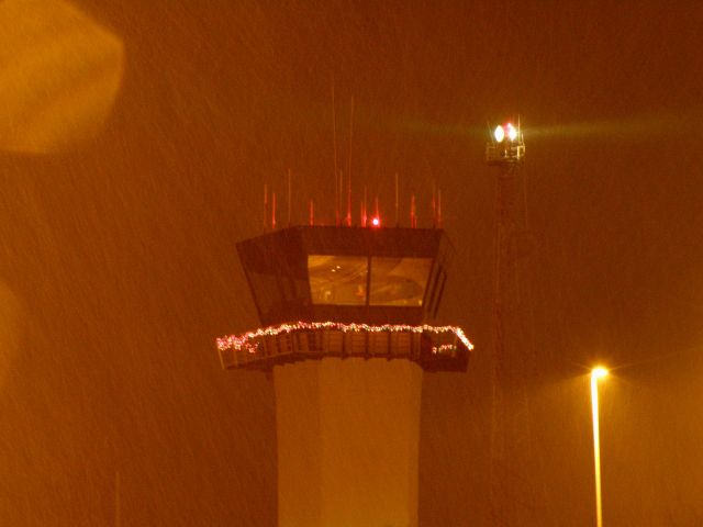 KLEX — - Special Christmas Obstruction Lights twinkle thru the blowing snow at Blue Grass Airport (KLEX) early into the first measurable snow of the season (0615 19 Dec 2009).