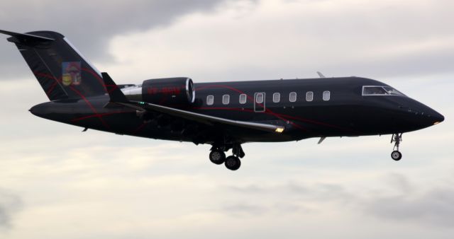 Canadair Challenger (VP-BGM) - Beautiful black Challenger landing at POS