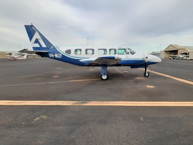 Piper Navajo (VH-MZF) - PA31 VH-MZF Parked on the GA Parking area 