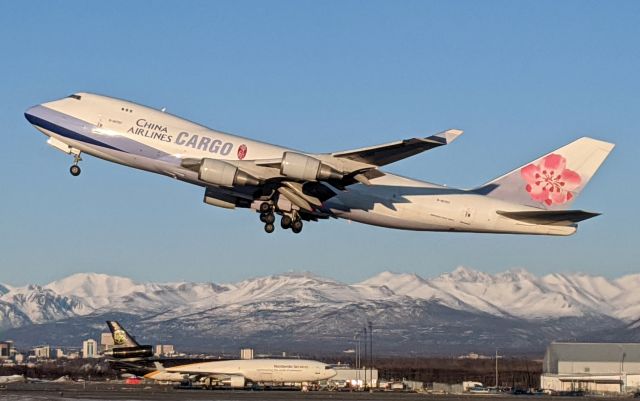 Boeing 747-400 (B-18707) - Takeoff viewed from West side of N-S runway