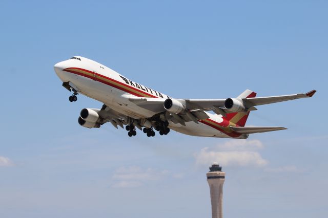 Boeing 747-400 (N710CK) - Miami (MIA). Kalitta Air flight K4539 climbs away from runway 27 departing for Santiago Arturo Merino Benítez (SCL). br /Taken from El Dorado Furniture Store, NW 72nd Avenue adjacent to runway 27/09 south of the airfieldbr /br /https://alphayankee.smugmug.com/Airlines-and-Airliners-Portfolio/Airlines/AmericasAirlines/Kalitta-Air-K4/br /br /2021 05 01