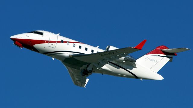 Canadair Challenger (XA-MXJ) - 31L departure.