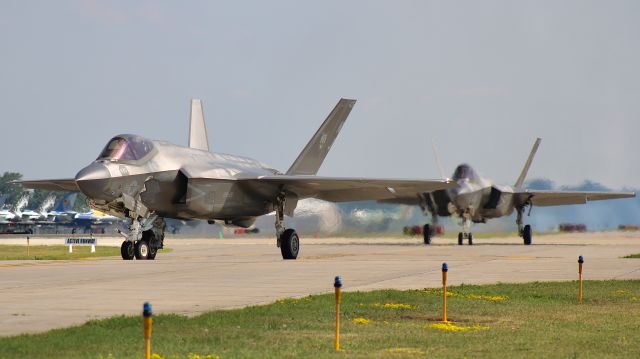 Lockheed F-35C (16-9303) - Two F-35C’s, of VFA-125, taxiing in after arrival at Oshkosh. br /br /7/28/23