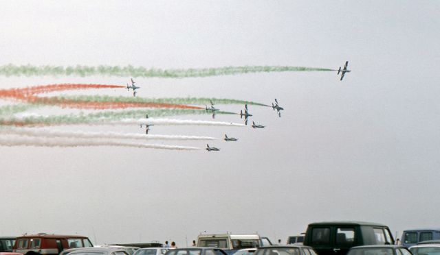 AERMACCHI MB-339 — - McGUIRE AIR FORCE BASE, WRIGHTSTOWN, NEW JERSEY, USA-AUGUST 1986: Performing at the August 1986 Open House and Air Show was the Italian Air Force Aerobatic Team "Frecce Tricolori" (Three-Colored Arrows). 