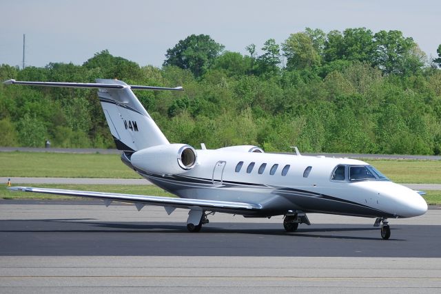 Cessna Citation CJ4 (N4M) - MME-CJ4 LLC (NASCAR driver Mark Martin) arriving at KJQF - 4/21/11