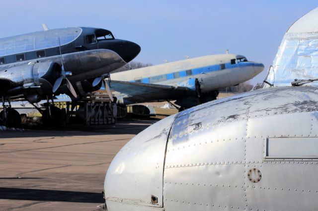 Douglas DC-3 — - Awaiting their fate at Basler Turbo Conversions...........