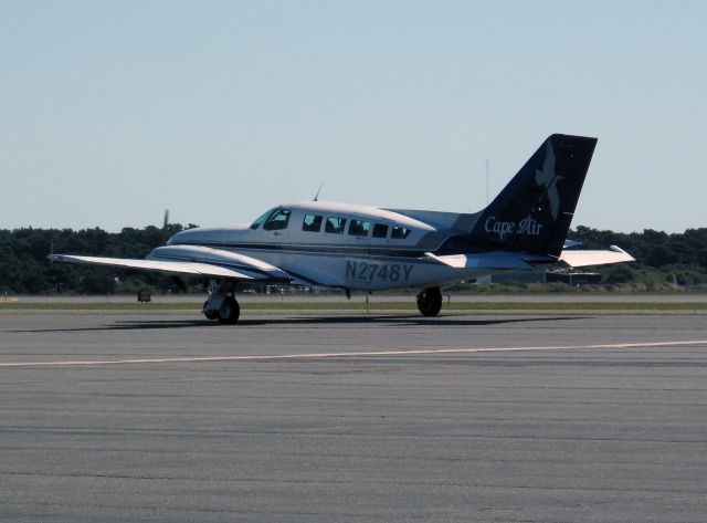 Cessna 402 (N2748Y) - Taxiing inafter a perfect landing under gusting wind conditions.