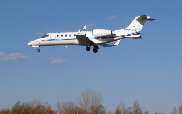 Learjet 45 (N826CA) - Perfect landing under difficult wind conditions.