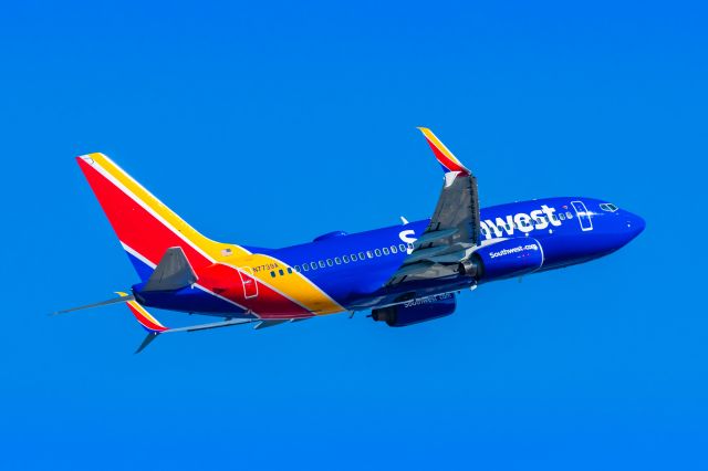 Boeing 737-700 (N7739A) - A Southwest Airlines 737-700 taking off from PHX on 3/4/23. Taken with a Canon R7 and Canon EF 100-400 L II lens.