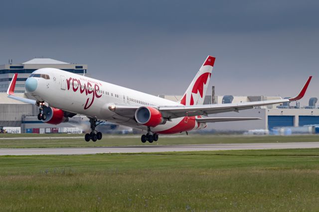 BOEING 767-300 (C-GHPN) - Rouge 1589 leaving Montreal for Edmonton.