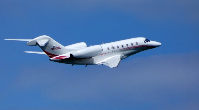 Cessna Citation X (N249AL) - Shortly after departure is this 2005 Cessna Citation X in the Summer of 2019.