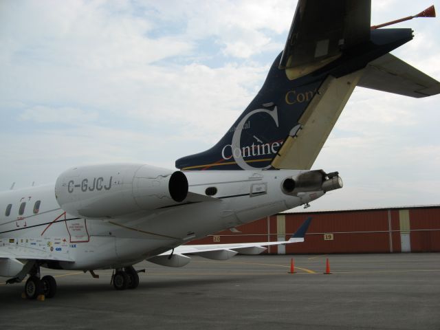 Bombardier Challenger 300 (C-GJCJ) - Challenger 300 test aircraft at Fulton, NY 9/26/07 after a test flight.  Aircraft is registered as experimental to  Bombardier Inc.  Note the rudder painted in green chromate and the tail probe.