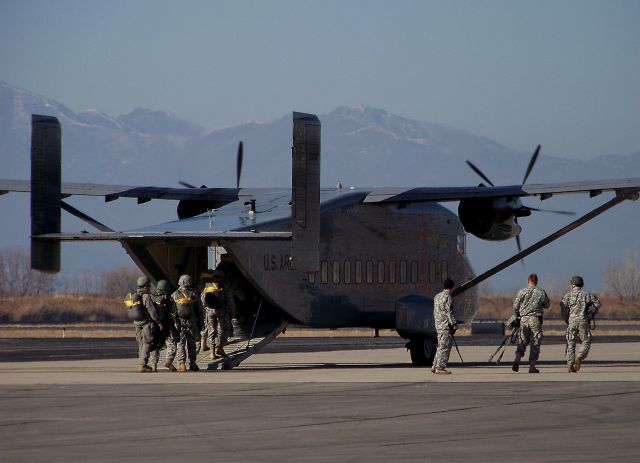 93-1317 — - US Army troops loading up to jump