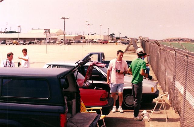 — — - KLAX- This is what the good Ole days looked like. LAX - Imperial Terminal parkling lot - 6ft fence - 2 step ladders - no Cops and lots of friendship and fun. All LAX officials had to do, instead of being rinky dink like San Jose Airport, was enact a registration system, license plate and drivers license, and they could easily have left this lot open to aircraft photographers - I would have even paid for an annual membership...!! But no,,,,,,,,,,,,,,,