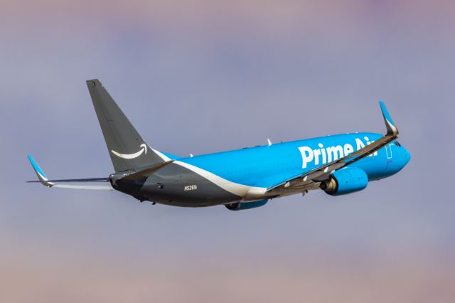 Boeing 737-800 (N5261A) - An Sun Country 737-800 operating for Prime Air taking off from PHX on 2/11/23 during the Super Bowl rush. Taken with a Canon R7 and Canon EF 100-400 II L lens.