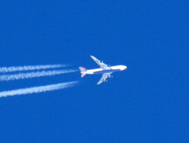 Boeing 747-400 — - Delta Airlines,flight#172, B747-400 series flying over London,Canada(CYXU) coming from Narita Intl on its way to JFK In New York.taken March5/2013