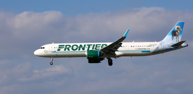 Airbus A321neo (N616FR) - About to touch down is this brand new Frontier Airlines Airbus 321-271NX with "Sierra" the Bighorn Sheep getting the tail view in the Autumn of 2023.