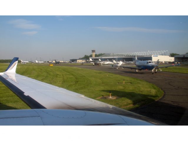 Beechcraft Super King Air 350 (N904MC) - Take off RW11 on a busy summer day.