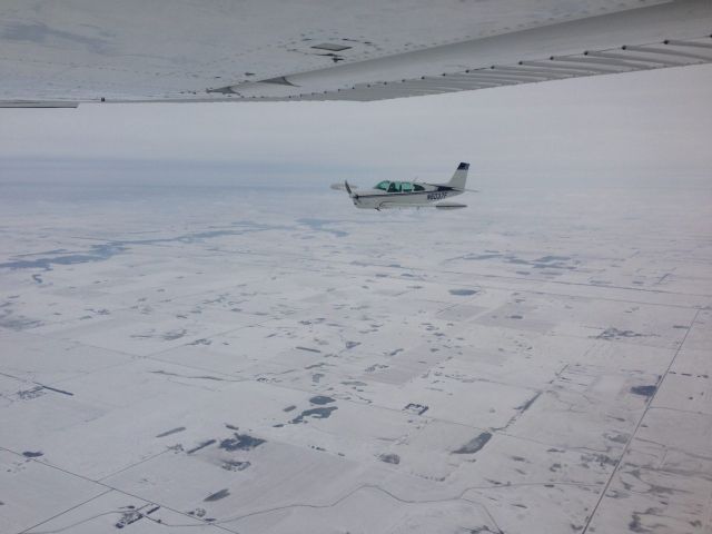 Beechcraft Bonanza (33) (N6037F) - Me flying this Debonair to OKK from IKK. C182 Photoship: (N28AC)