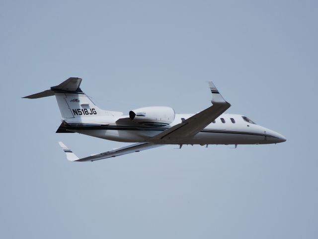 Learjet 31 (N518JG) - JOE GIBBS RACING INC departing runway 2 at KJQF - 3/18/10