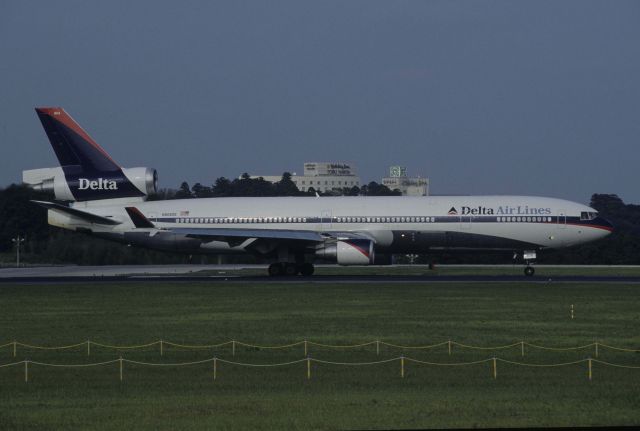 Boeing MD-11 (N804DE) - Departure at Narita Intl Airport Rwy16R on 1998/09/05