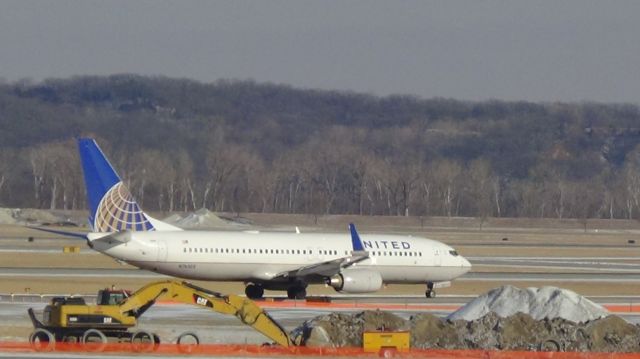 Boeing 737-800 (N76505) - United 1463 passes ramp and runway 36 construction.
