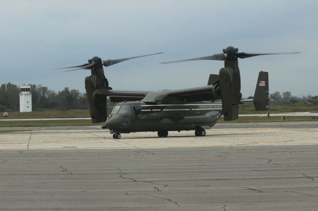 — — - On ramp watching V-22 Osprey taxi in at Gary/Chicago Airport. 