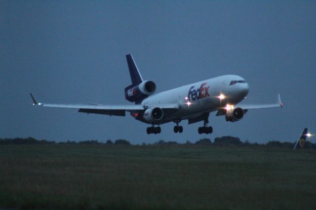 Boeing MD-11 (N525FE) - A FedEx McDonnell Douglas MD-11F landing on runway 22 at London Stansted Airport.br /br /Location: London Stansted Airport.br /Date: 12.10.22 (dd/mm/yy).