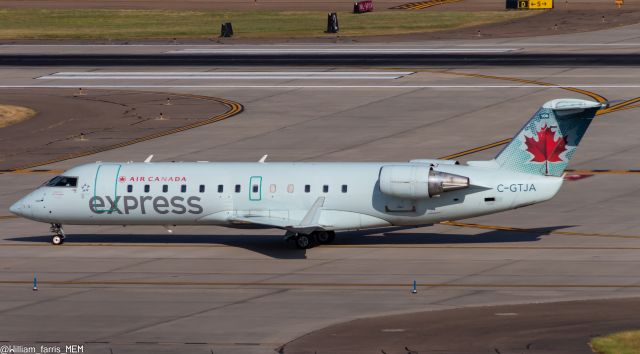 Canadair Regional Jet CRJ-200 (C-GTJA) - The last of the green grass.