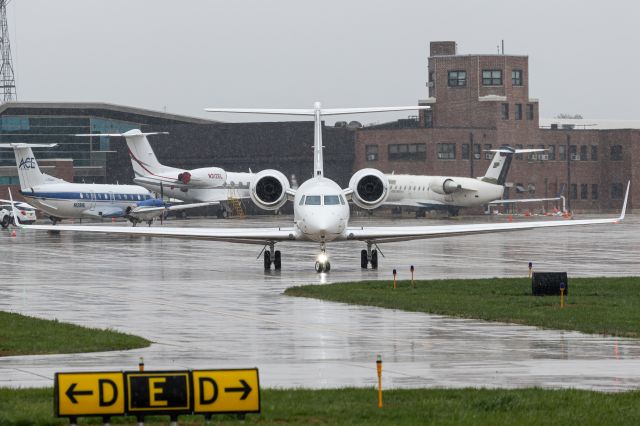 Gulfstream Aerospace Gulfstream V (N552MW) - The taxiways in the bottom of the frame show how I felt waking up and realizing it was going to snow in late April... and getting my shoes and clothes soaked taking this photo