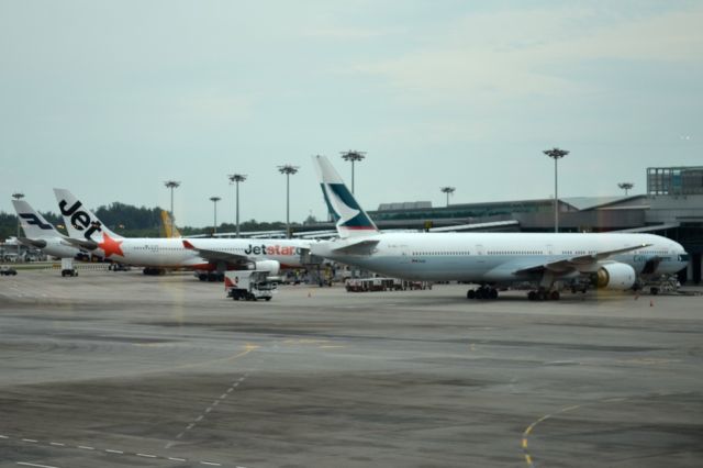 BOEING 777-300 (B-HNJ) - Part of the ramp at terminal 1, in the early evening. Tues. 16th July 2013.