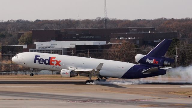 Boeing MD-11 (N631FE) - "Lucas" touches down on 18R.