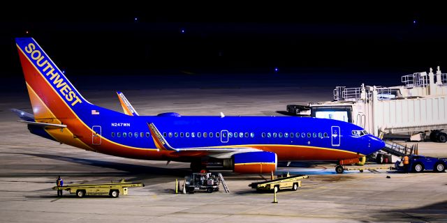 Boeing 737-700 (N247WN) - Ready for a predawn push back.