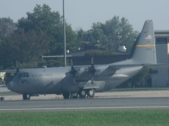 Lockheed C-130 Hercules (N20059) - Not that good of a picture taken across the airport. Taken 9-22-12