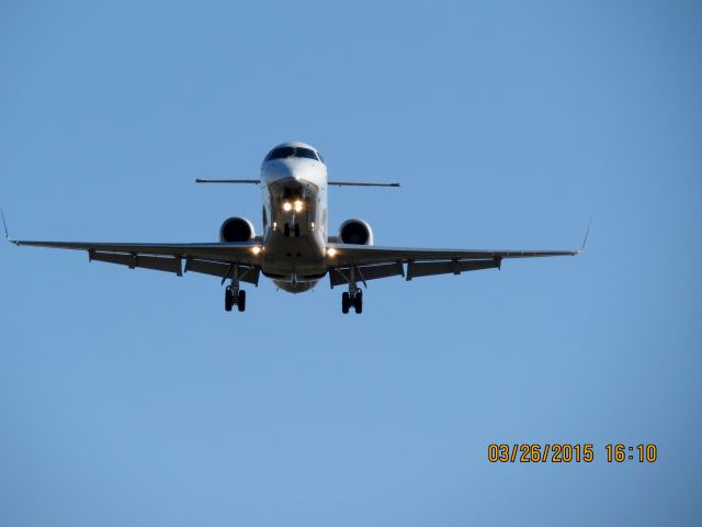 Embraer EMB-145XR (N11107) - Express Jet landing on runway 36R at Tulsa International from Houston.