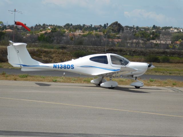 Beechcraft Beechjet (N138DS) - I was standing near the Skydiving Facility on Sunday, May 17, 2015 and took some photos on my Nikon L840 camera.