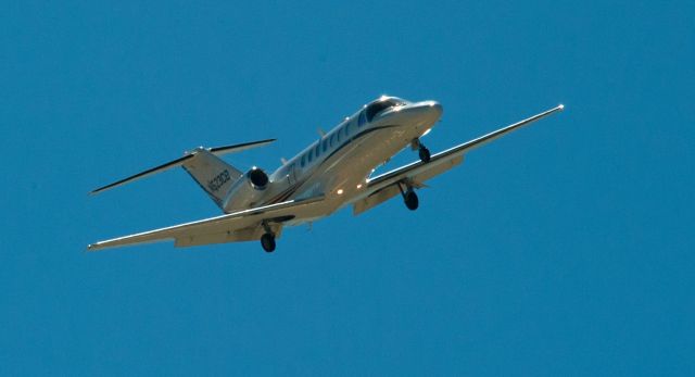 Cessna Citation CJ3 (N523CB) - Right upwind to base for 09 at Carson City