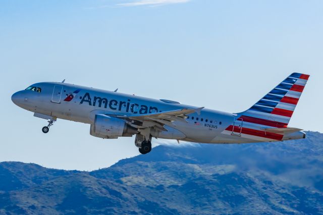 Airbus A319 (N763US) - An American Airlines A319 taking off from PHX on 2/12/23 during the Super Bowl rush. Taken with a Canon R7 and Canon EF 100-400 II L lens.