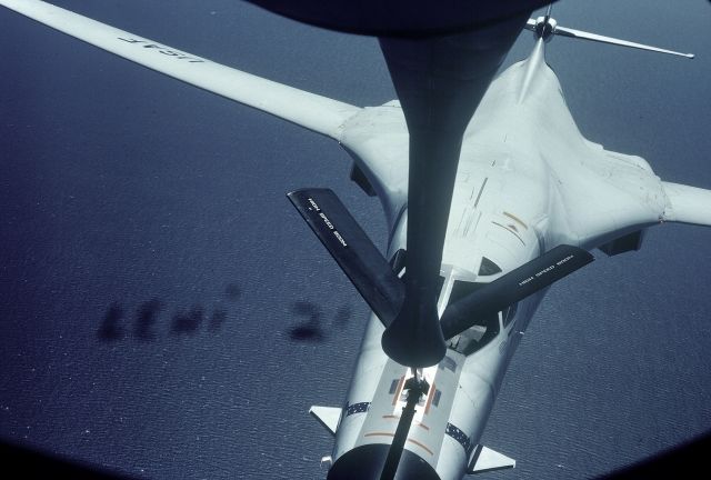 — — - Refueling the B-1A over the Pacific during initial flight testing out of Edwards AFB with F-111 chase plane  August 1976