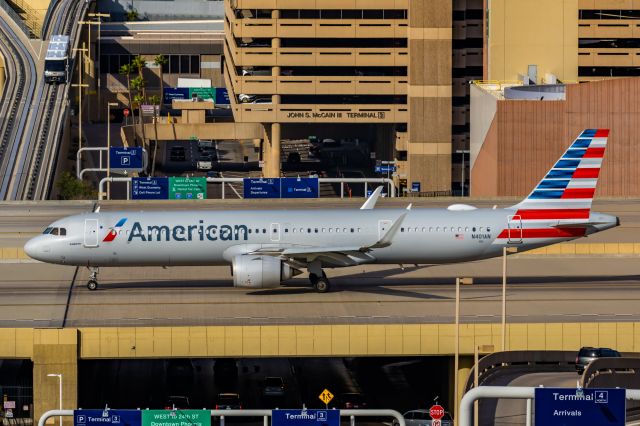 Airbus A321neo (N401AN) - An American Airlines A321 neo taxiing at PHX on 2/13/23, the busiest day in PHX history, during the Super Bowl rush. Taken with a Canon R7 and Canon EF 100-400 II L lens.